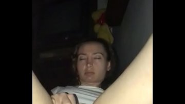 excited young woman rubs clitoris